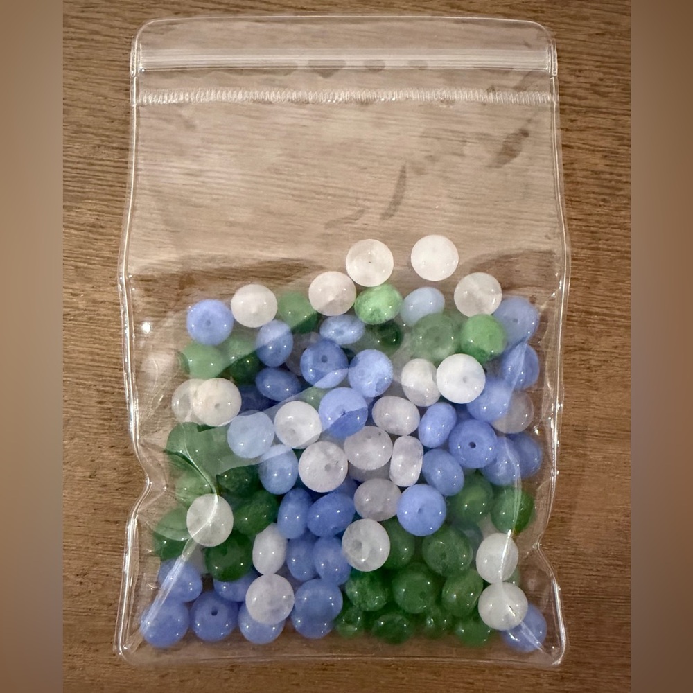 128 Assorted Blue, Green, and White Party Beads